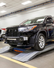 Toyota on vehicle lift | DARCARS Toyota of Baltimore in Baltimore MD