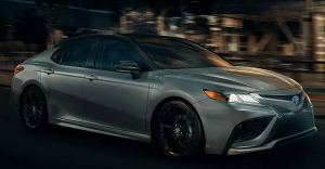 2022 Toyota Camry Hyrbid Driving at Night in Baltimore, MD