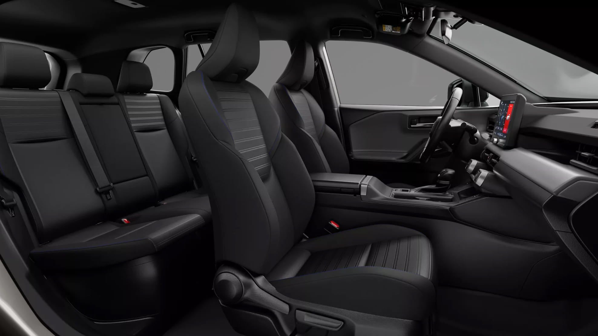 Toyota RAV4 interior featuring black fabric seats with blue accents.