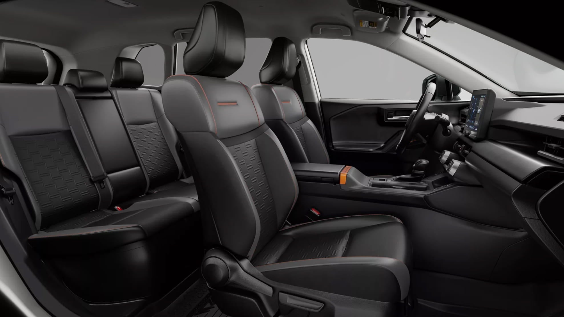 Toyota RAV4 interior featuring black softex seats.