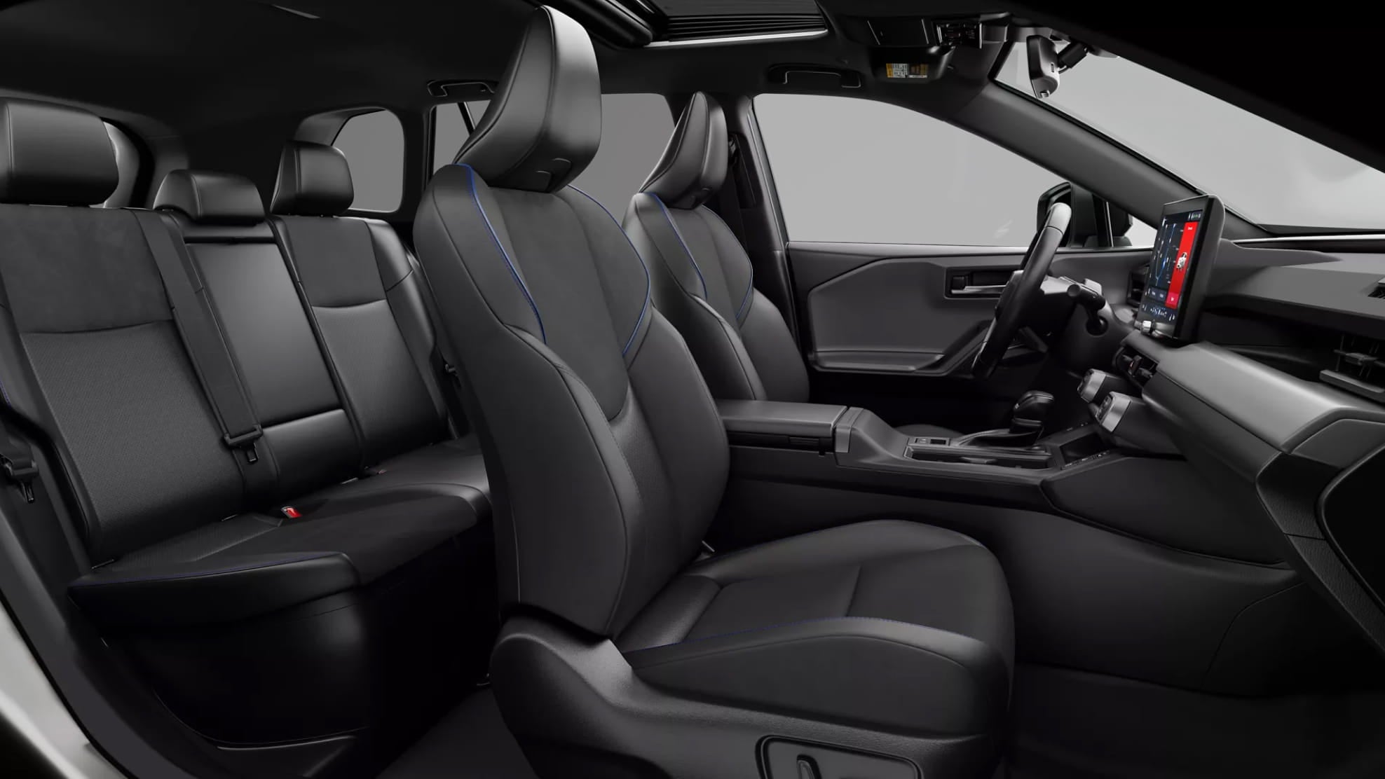 Toyota RAV4 interior featuring black softex with blue accent seats.