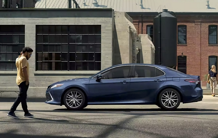 Blue Toyota Camry Hybrid
